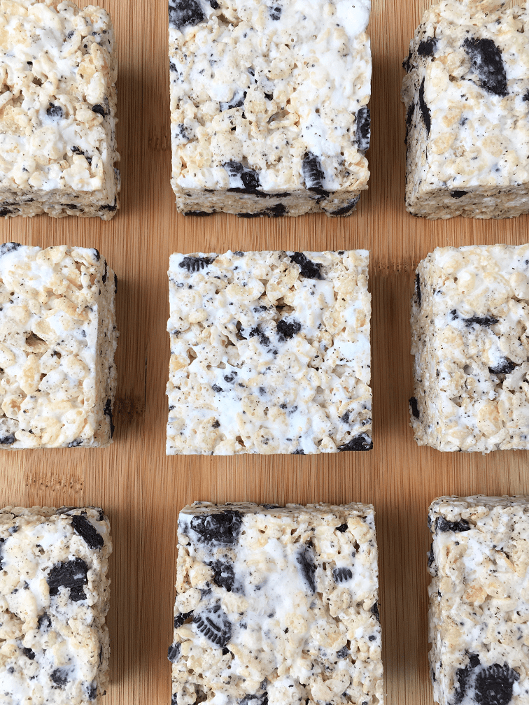 top view of cut cookies and cream rice krispies treats in rows