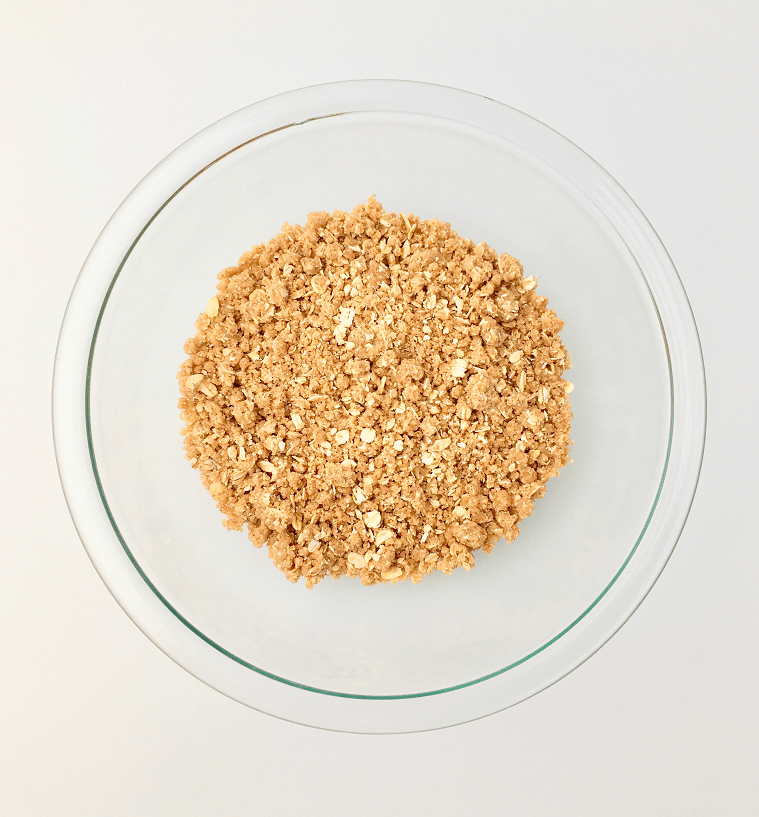 Crumbly streusel in a glass bowl