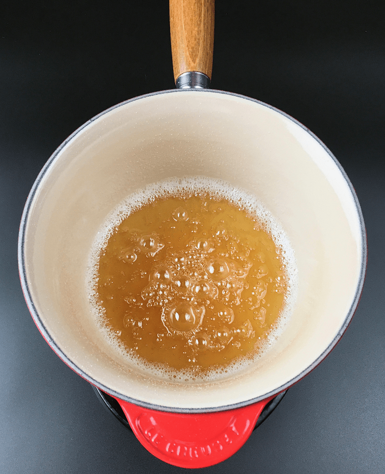 Caramelized sugar in an enameled saucepan