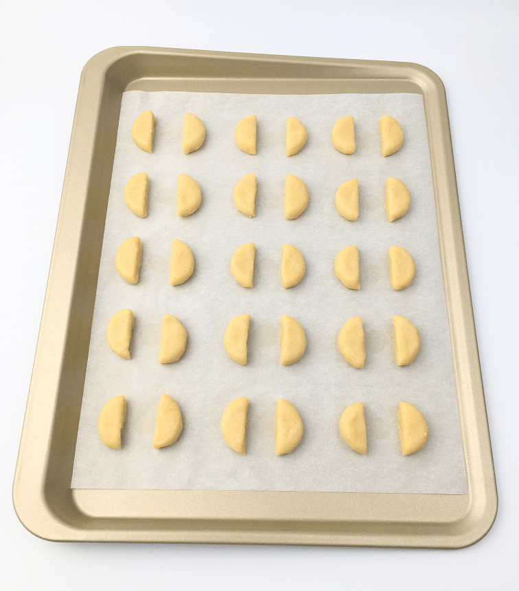 Shaped lemon sunshine cookie dough on a baking sheet