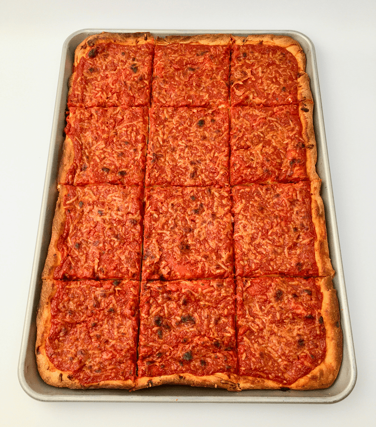 Baked tomato pie cut into slices