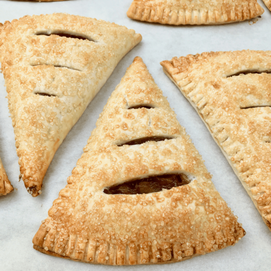 Close up of freshly baked apple hand pies