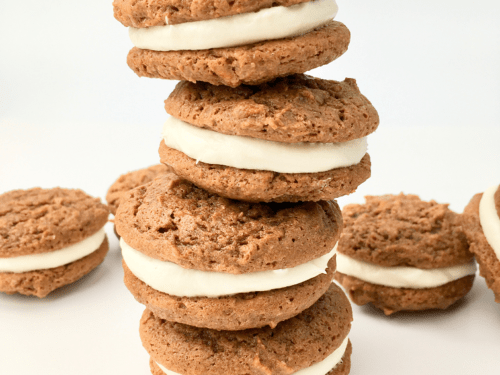 Stack of four carrot cake sandwich cookies