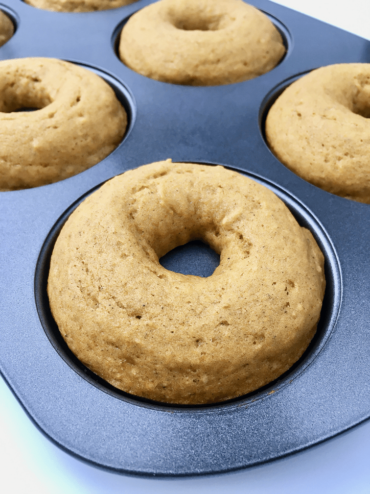 Pumpkin donuts baked in the donut pan.