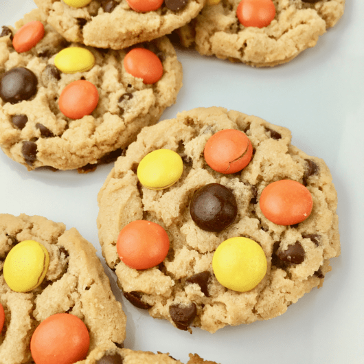 Close up of Reese's pieces peanut butter cookies on a plate