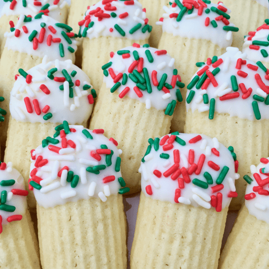 Rows of Italian butter cookies arranged on a plate