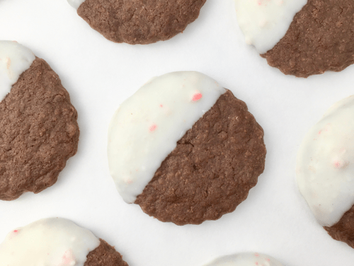 Close up of diagonal rows of peppermint bark shortbread cookies