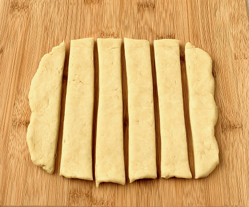 Blackberry cobbler dough rolled out and cut into strips