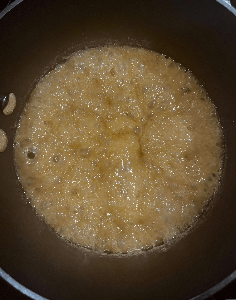 Maple spice caramel boiling in a saucepan.