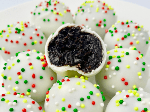 Boozy Oreo truffles with white chocolate and sprinkles.