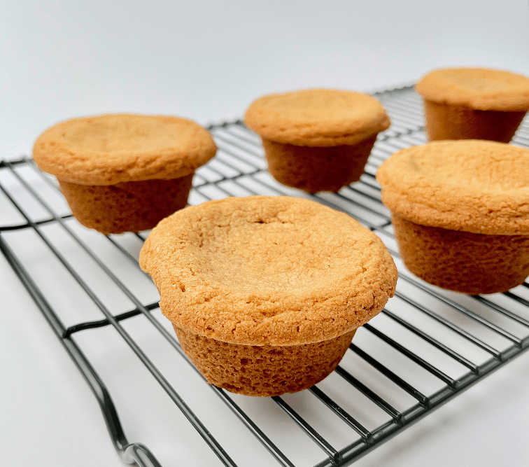 Baked deep dish smores cookies on a wire rack.